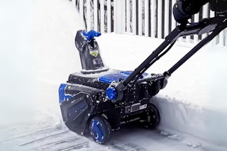 Snow Joe Snow Blower lifestyle image from homedepot.com