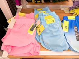 all in motion kids' run shorts sitting on a target shelf