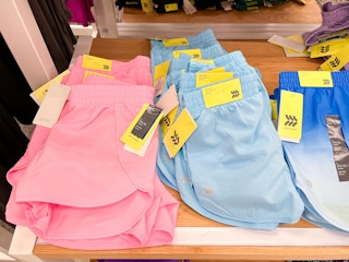 all in motion kids' run shorts sitting on a target shelf