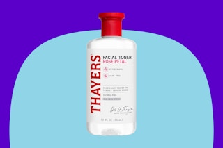 THAYERS Alcohol-Free Rose Petal Witch Hazel Facial Toner on a blue background.