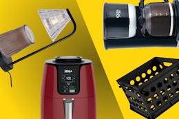 candle warming lamp, red air fryer, black coffee machine, and storage