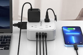 a bunch of deviced plugged into a Surge Protector Power Strip