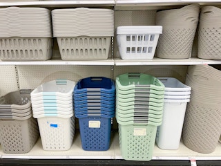 A variety of hampers sitting on store shelves.